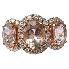 14 Kt Rose Gold 2.75ct. Morganite and .75ct Diamond Halo Ring (10mm wide)