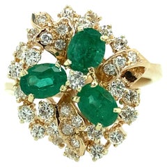 14 Karat Gold Emerald and Diamond Cluster Ring