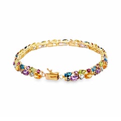 Bracelet tennis « Harlequin » contemporain en or jaune 14 carats, serti de plusieurs pierres précieuses totalisant 12,40 carats