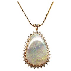 Contemporary 5.60ct Pear Cabochon Opal & Diamond 14K Yellow Gold Halo Pendant