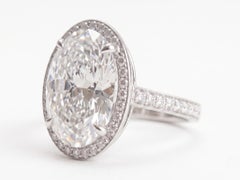 GIA Certified 4 Carat Oval Cut D Color VS1 Clarity Diamond Ring with Halo