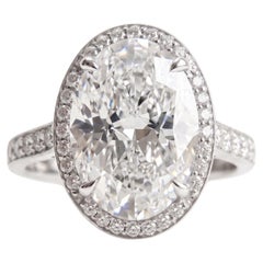 GIA Certified 4 Carat Oval Cut D Color VS1 Clarity Diamond Ring with Halo