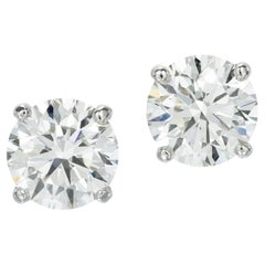 Triple Excellent GIA Certified 7.20 Carat Round Brilliant Cut Diamond Studs