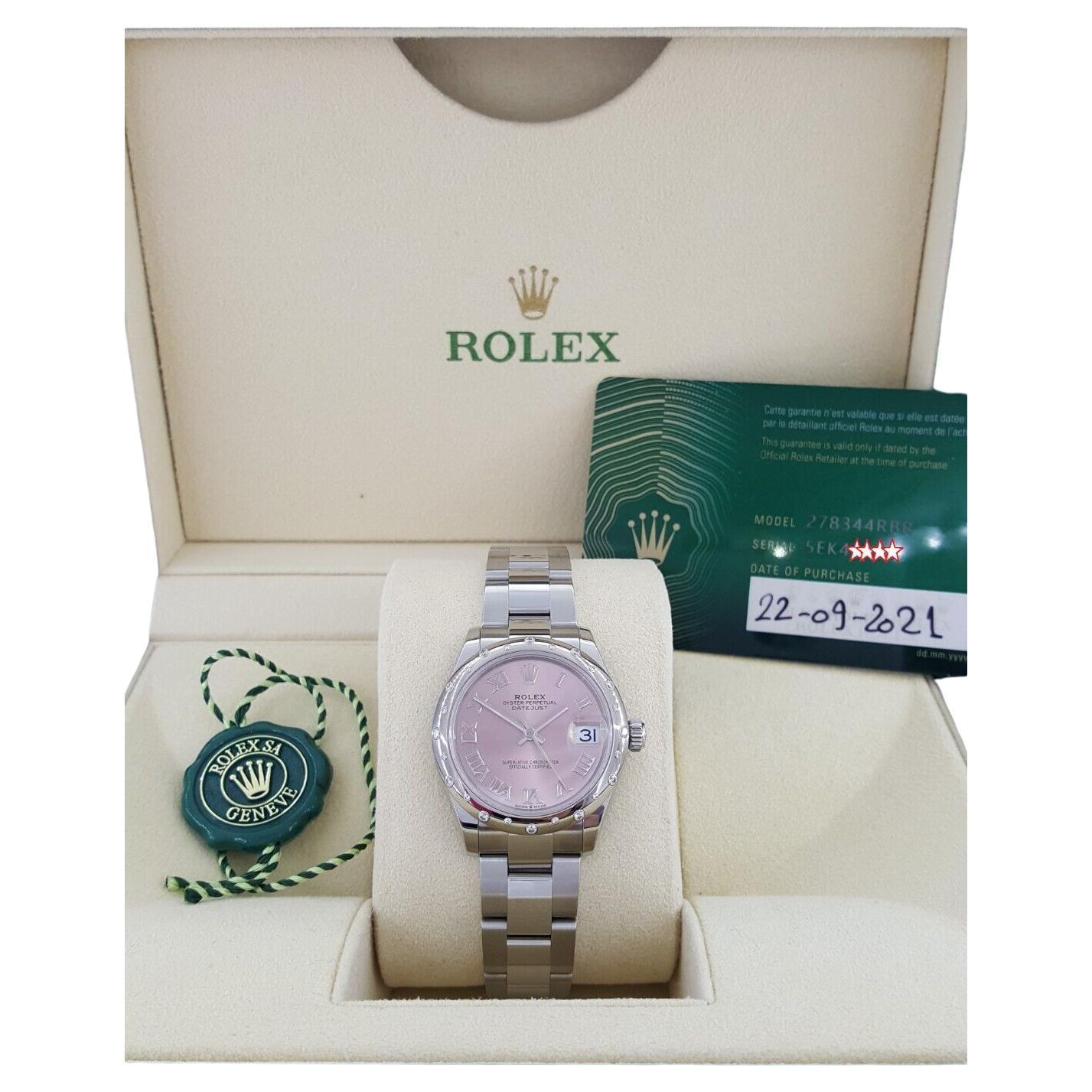 The Rolex Lady DateJust 278344 Stainless 31 mm Factory Diamond Bezel features a screw-down crown, 18K White gold Rolex Smooth bezel with Factory Diamonds, sapphire cyclops crystal, Oyster Bracelet, date calendar at 3 o'clock aperture, and can fit up