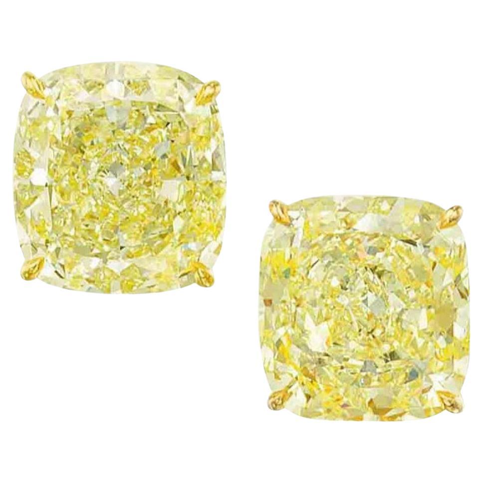 GIA Certified Fancy Yellow 4 Carat Cushion Cut Diamond Studs