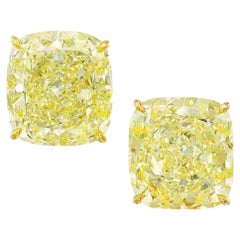 GIA Certified Fancy Yellow 4 Carat Cushion Cut Diamond Studs