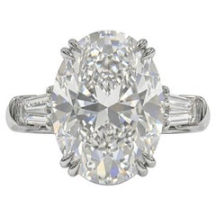 GIA Certified 5.02 Carat Oval Cut Diamond Engagement Ring with tapered baguette