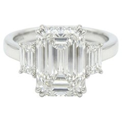 GIA Certified 5.01 Carat Emerald Cut Diamond VVS1 Three Stone Ring in Platinum
