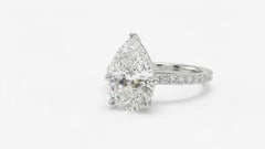 GIA Certified 4 Carat Pear Cut E Color Diamond Ring with pavè in 18K White Gold