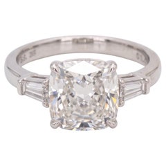 GIA Certified 5.06 Carat Cushion Cut Diamond E Color Ring with Tapered Baguette