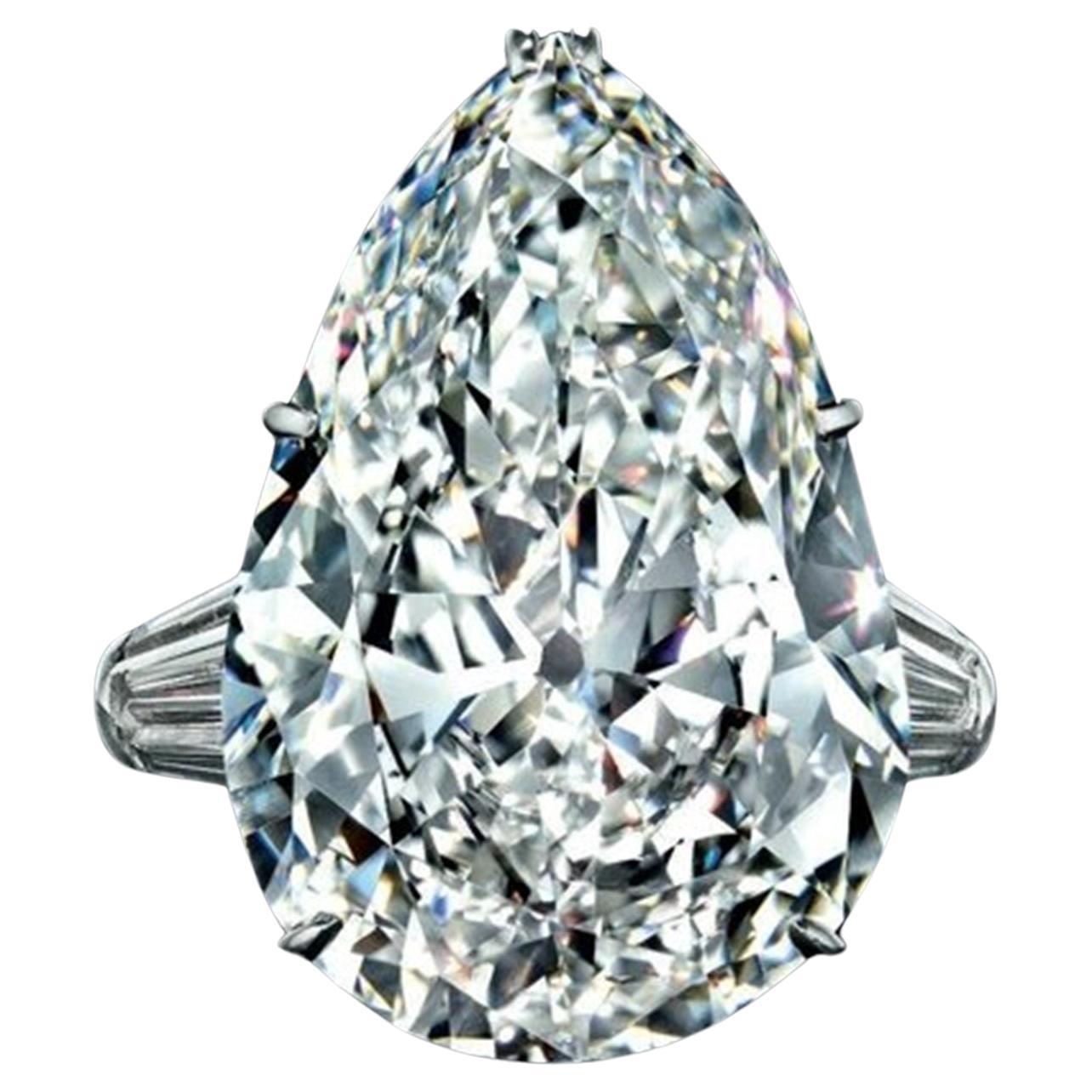 GIA Certified 6.01 Carat Pear Cut Diamond F Color Ring with tapered baguette