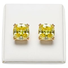 GIA Certified 6.16 Carat Cushion Cut Fancy Yellow Diamond Stud Earrings