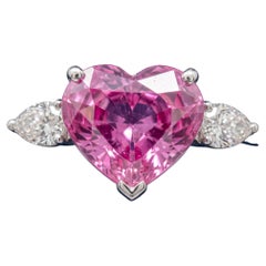 GIA Certified 4.15 Carat Heart-Shaped Pink Sapphire and Diamond Three-Stone Ring
