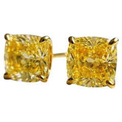 GIA Certified 4.03 Carat Fancy Yellow Cushion-Cut Diamond Stud Earrings