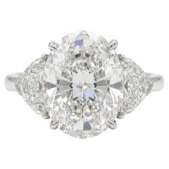 GIA Certified 4.01 Carat Oval Cut VVS2 Clarity Diamond Three Stone Platinum Ring