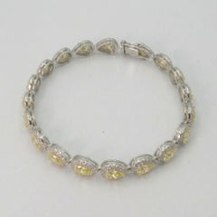 12.9 Carat Fancy Yellow Diamond and White Diamond Tennis Bracelet