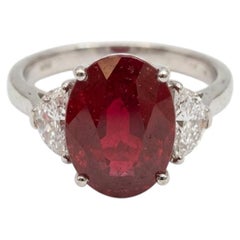 GIA Certified 7 Carat Ruby and Diamond Three-Stone Ring