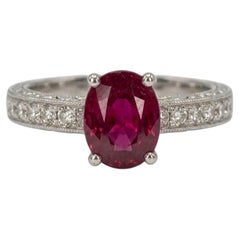 Bague de fiançailles avec rubis ovale d'1 carat et diamants