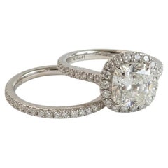 Conjunto de anillo de compromiso y alianza «The One» de Harry Winston con un diamante de 2 quilates en talla cojín