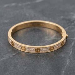 Bracciale Cartier LOVE con pavé di diamanti in oro rosa 18 carati