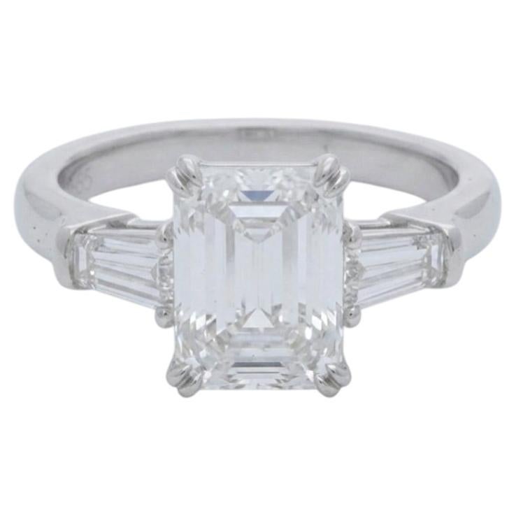Harry Winston 2 Carat Emerald Cut Diamond Three-Stone Platinum Ring For Sale