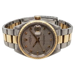Rolex Oyster Perpetual Date 34 mm – Armbanduhr mit zweifarbiger, guillochierter Lünette