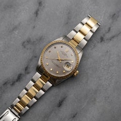 Rolex Oyster Perpetual Date 34 mm – Armbanduhr mit zweifarbiger, guillochierter Lünette