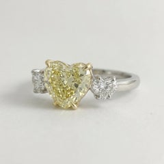 GIA Certified 2 Carat Fancy Yellow Heart Diamond Three-Stone Ring