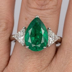 6.10 Carat Vivid Green Colombian Pear Shape Emerald Diamond Three Stone Ring