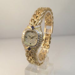 Patek Philippe La Flamme 18k Yellow Gold Diamond and Sapphire Wrist Watch