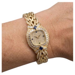 Patek Philippe La Flamme 18k Yellow Gold Diamond and Sapphire Wrist Watch