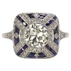 2-Karat-Ring aus Platin im Art-déco-Stil mit einem Diamanten im alten europäischen Schliff und einem Saphir
