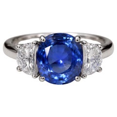 GIA 7.47 Carat Unheated Ceylon Sapphire and Diamond Three Stone Ring