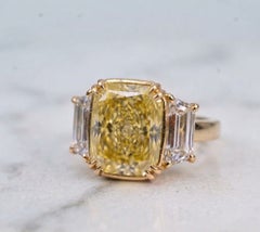 10 Carat Fancy Intense Yellow VS2 Cushion Modified Brilliant Diamond Ring