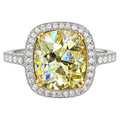 GIA 6.5 Carat Fancy Yellow Old Mine Diamond Platinum Halo Ring