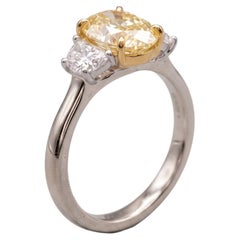 2 Carat Fancy Light Yellow VS1 Oval Diamond Two-Tone Ring
