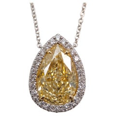 GIA Certified 8 Carat Fancy Intense Yellow SI1 Pear Diamond Necklace