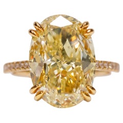 GIA-zertifizierter Ring aus Gelbgold mit einem ovalen, 5-Karat-Diamanten in der Farbe „Fancy Yellow“
