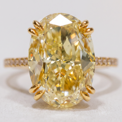 GIA-zertifizierter Ring aus Gelbgold mit einem ovalen, 5-Karat-Diamanten in der Farbe „Fancy Yellow“