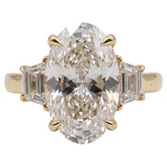GIA Certified 7 Carat E VS2 Oval Diamond Yellow Gold Ring