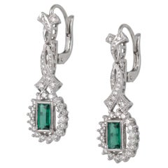 Colombian Emerald Diamond Halo Art Deco Platinum Dangle Earrings