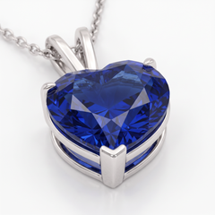 Collier en or blanc certifié, orné d’un saphir de Ceylan non traité, d’un diamant « cœur » bleu d’un carat