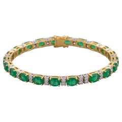 Bracciale tennis con smeraldo ovale da 6 carati e diamanti in oro bianco 14K