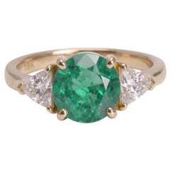 Bague en or jaune sertie d’un diamant de 4,03 carats, taille ronde/brillant modifiée, de couleur vert vif