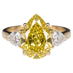 3.02 Carat Fancy Vivid Yellow Pear Modified Brilliant Diamond Ring