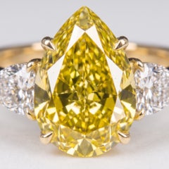 3.02 Carat Fancy Vivid Yellow Pear Modified Brilliant Diamond Ring