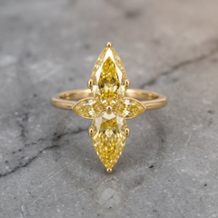 GIA Certified 2.5 Carat Total Fancy Yellow 4-Stone Pear Diamond Ring