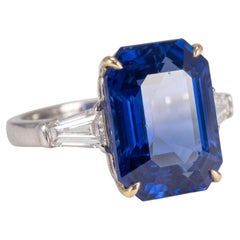 4.07 Carat Intense blue Octagonal/step cut Sapphire White and Yellow Gold Ring