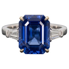4.07 Carat Intense blue Octagonal/step cut Sapphire White and Yellow Gold Ring