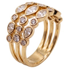 Bague Kwiat à trois rangées, en or jaune 18 carats, sertie d'un diamant de 2 carats